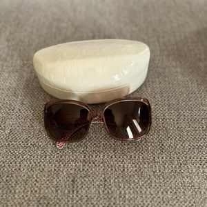 Woman’s Coach sunglasses
